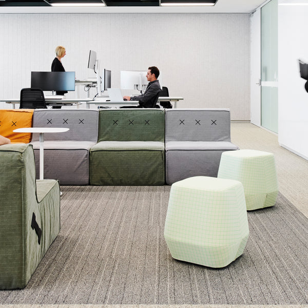 Noisy workspaces are stressing us out. Here’s how to reduce open office noise.